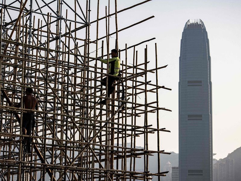 Scaffolders constructing bamboo scaffolding. (AFP) Scaffolders constructing bamboo scaffolding. (AFP)