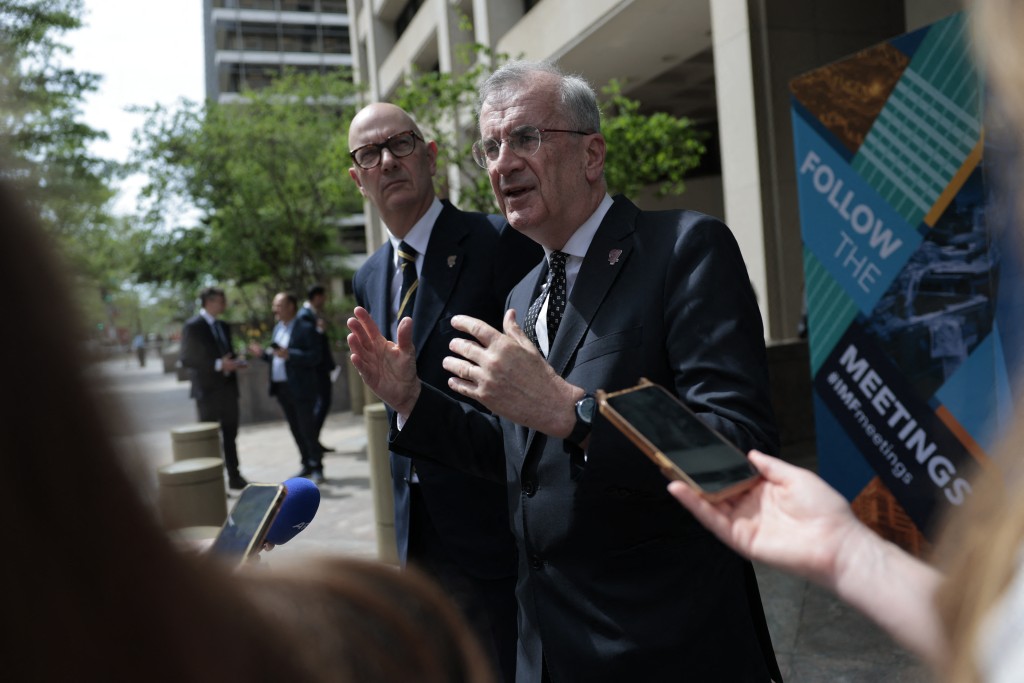 France's Economy and Finance Minister Roland Lescure (L) and Governor of the Bank of France François Villeroy de Galhau speak to reporters during the 2026 IMF and World Bank Group Spring Meetings in Washington, DC, on April 16, 2026. (Photo by Kent NISHIMURA / AFP)