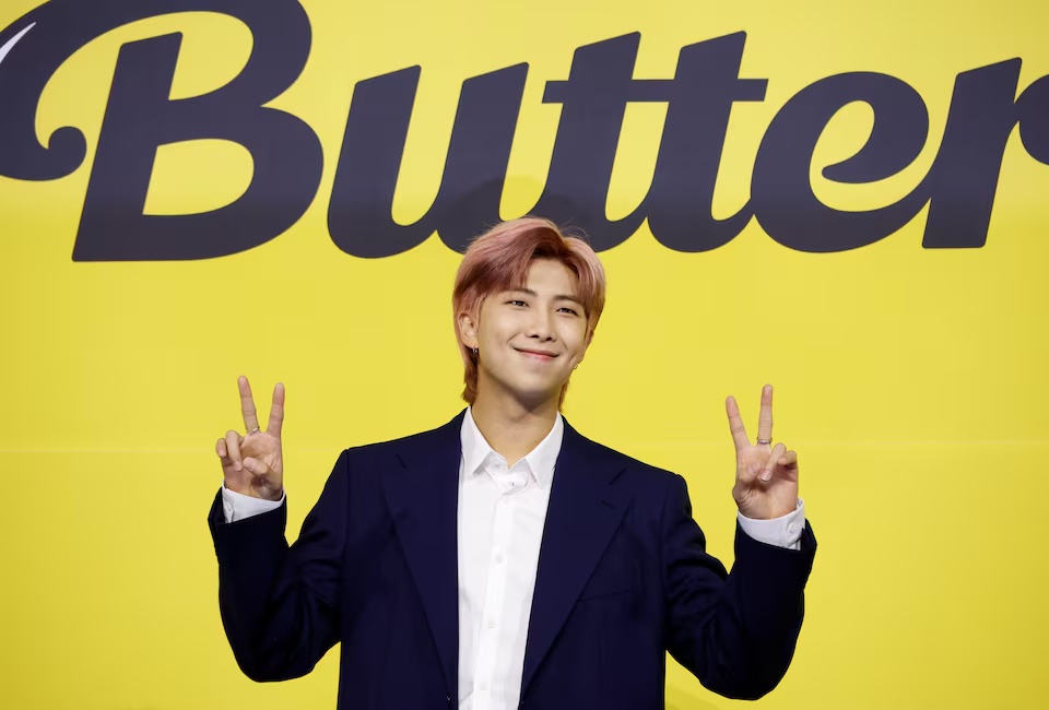 K-pop boy band BTS member RM poses for photographs during a photo opportunity promoting their new single 'Butter' in Seoul, South Korea, May 21, 2021. REUTERS/Kim Hong-Ji 