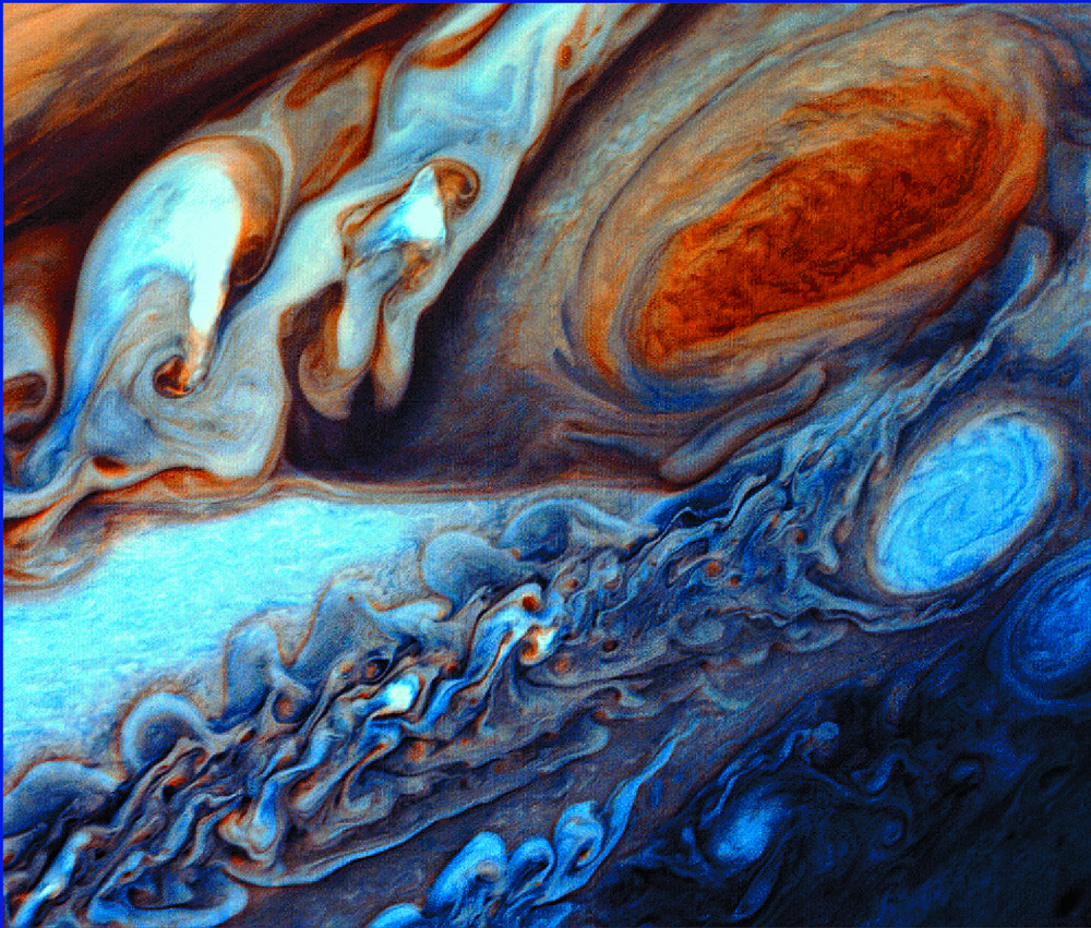 A photo of Jupiter taken by Voyager 1 and a rendering of the spacecraft. A photo of Jupiter taken by Voyager 1 and a rendering of the spacecraft.