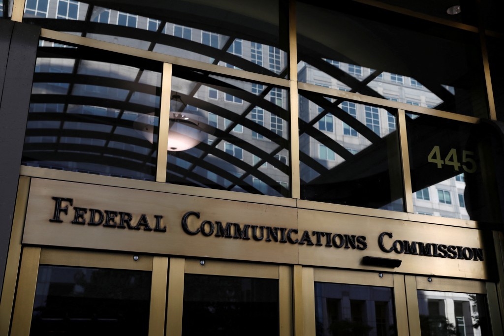 Signage is seen at the headquarters of the Federal Communications Commission in Washington, D.C., U.S., August 29, 2020. REUTERS/Andrew Kelly