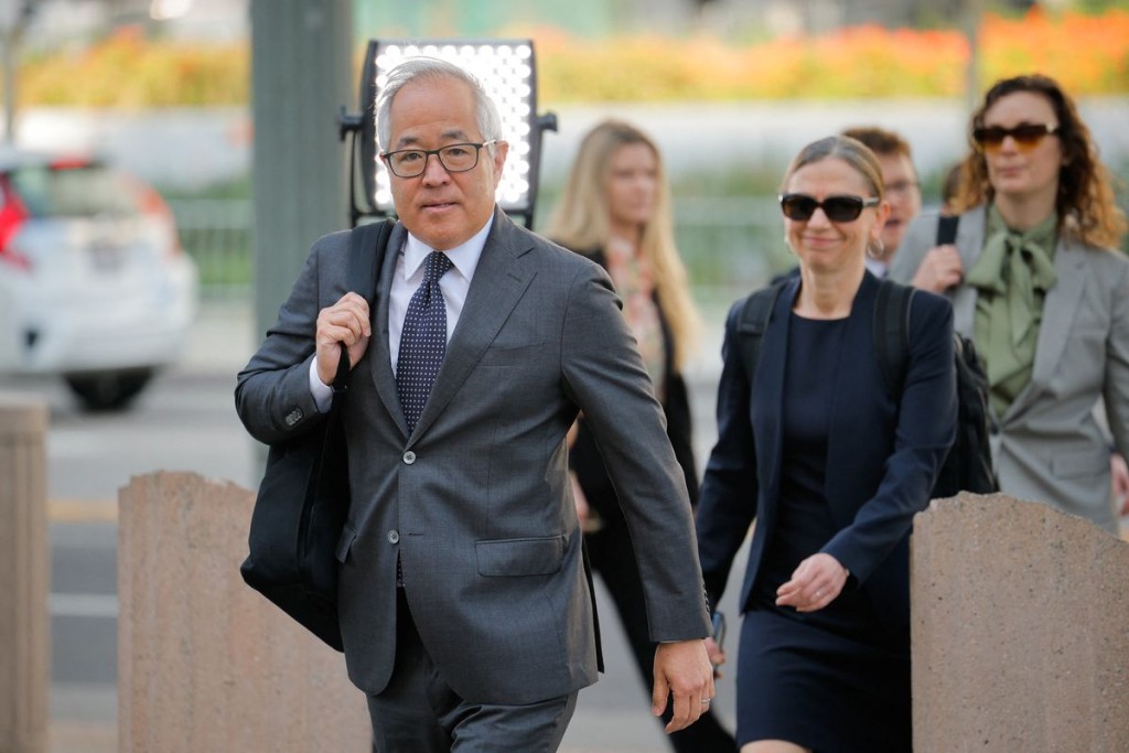 Lawyer Luis Li, representing YouTube and Google, arrives at the court after the jury reached a verdict. Reuters