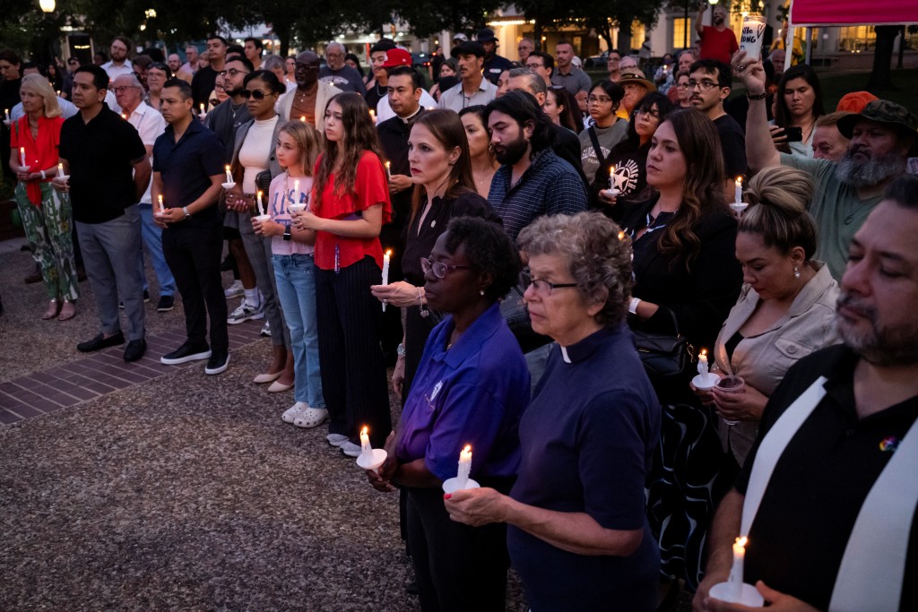 People take part in a vigil in memory of Texas flooding victims, at Travis Park in San Antonio, Texas, U.S. July 7, 2025. (Reuters)