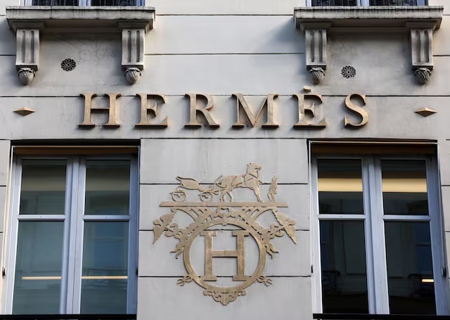 A logo of fashion house Hermes is seen outside a shop in Paris, France, April 15, 2024. REUTERS/Manon Cruz