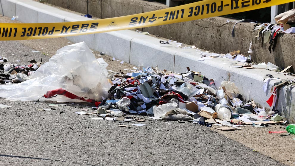 FILE - The trash from a balloon presumably sent by North Korea, is seen behind police tape in Incheon, South Korea, Sunday, June 2, 2024. South Korea has recently retaliated for North Korea's trash-carrying balloon launches with propaganda loudspeaker broadcasts at border areas. The South Korean broadcasts reportedly included K-pop sensation BTS’s mega hits like “Butter” and “Dynamite,” weather forecasts and news on Samsung as well as outside criticism on the North’s missile program.(Im Sun-suk/Yonhap via AP, File) FILE - The trash from a balloon presumably sent by North Korea, is seen behind police tape in Incheon, South Korea, Sunday, June 2, 2024. South Korea has recently retaliated for North Korea's trash-carrying balloon launches with propaganda loudspeaker broadcasts at border areas. The South Korean broadcasts reportedly included K-pop sensation BTS’s mega hits like “Butter” and “Dynamite,” weather forecasts and news on Samsung as well as outside criticism on the North’s missile program.(Im Sun-suk/Yonhap via AP, File)