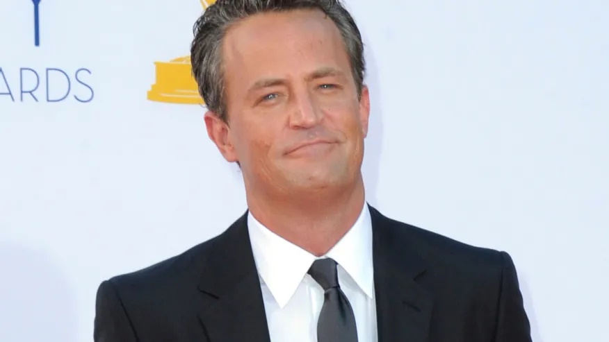 FILE – Actor Matthew Perry arrives at the 64th Primetime Emmy Awards in Los Angeles on Sept. 23, 2012. (Photo by Jordan Strauss/Invision/AP, File)