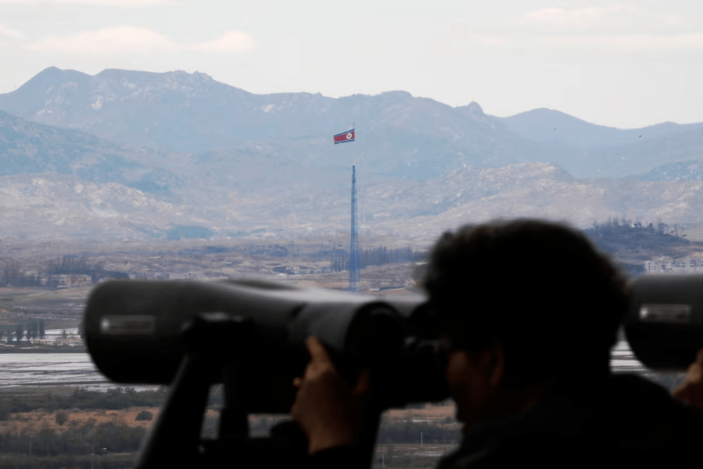 A North Korean flag flutters on top of a 160-metre tower in North Korea's propaganda village of Gijungdong in this picture taken from the Dora observatory near the demilitarised zone separating the two Koreas, in Paju, South Korea, April 24, 2018. REUTERS/Kim Hong-Ji/File Photo