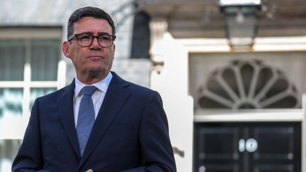 Newly appointed British PM Andy Burnham takes office. Reuters