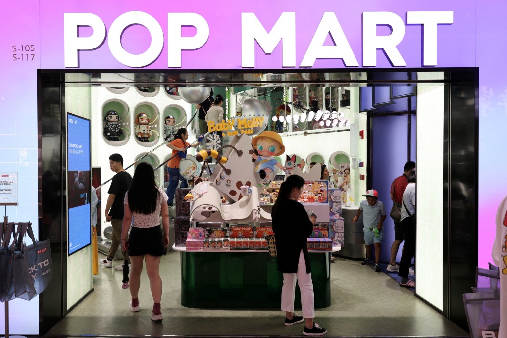 People visit Pop Mart's flagship store in Shanghai, China June 13, 2025. REUTERS