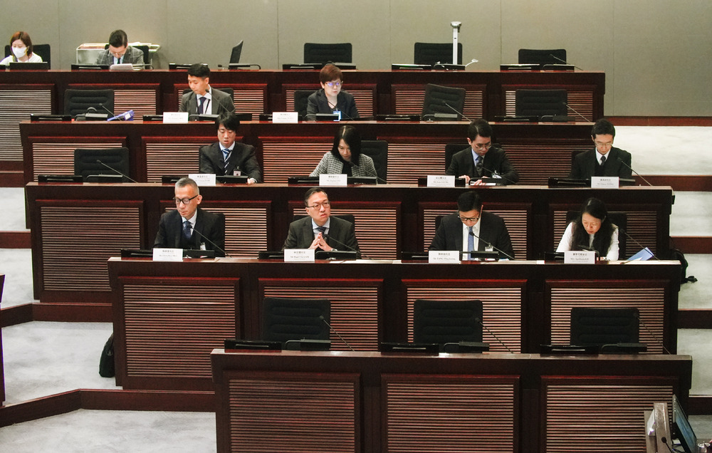 Paul Lam, front row, second left, attends the Legco meeting with Chris Tang, second right. SING TAO Paul Lam, front row, second left, attends the Legco meeting with Chris Tang, second right. SING TAO