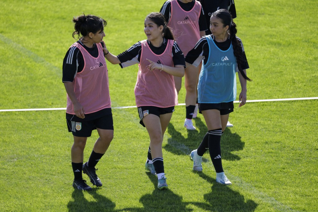 Afghan Women’s United football team players take part in a training session at Raja Club Athletic Academy (RAC) in Casablanca on October 24, 2025, ahead of the FIFA Unites: Women’s Series 2025. (Photo by Abdel Majid BZIOUAT / AFP)