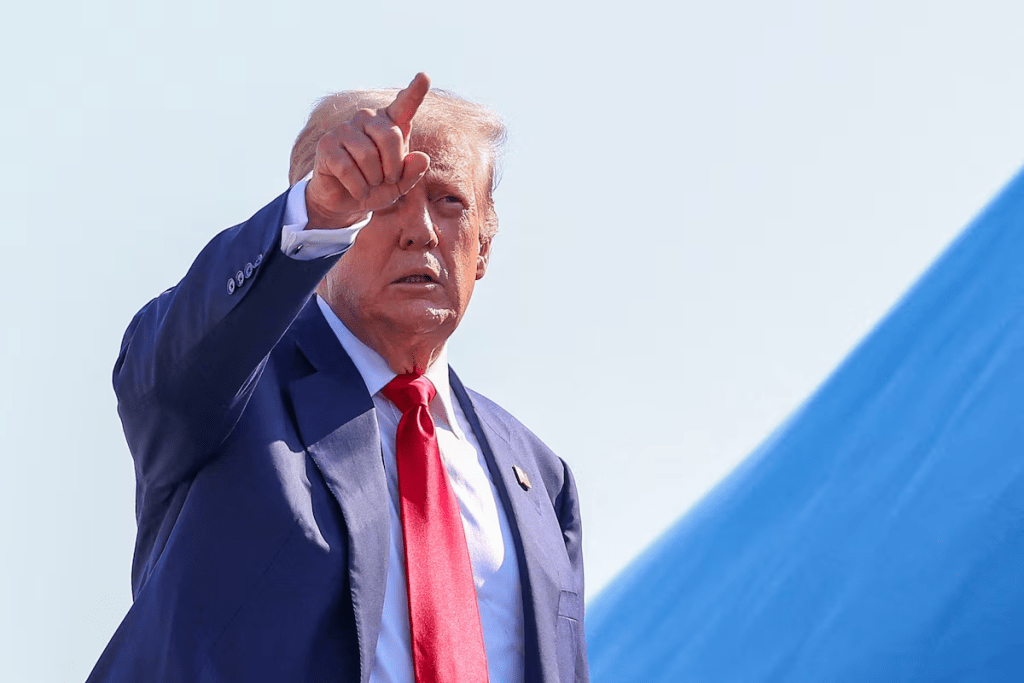 U.S. President Donald Trump gestures while boarding Air Force One, as he departs for Scotland, at Joint Base Andrews, Maryland, U.S., July 25, 2025. REUTERS/Evelyn Hockstein