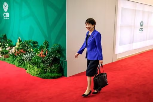 Japan's Prime Minister Sanae Takaichi arrives for the second day of the G20 Leaders' Summit, in Johannesburg, South Africa, Sunday, Nov. 23, 2025. (Marco Longari/Pool Photo via AP)