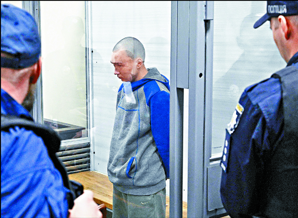 Vadim Shishimarin faces life imprisonment for war crimes and premeditated murder. AP Vadim Shishimarin faces life imprisonment for war crimes and premeditated murder. AP