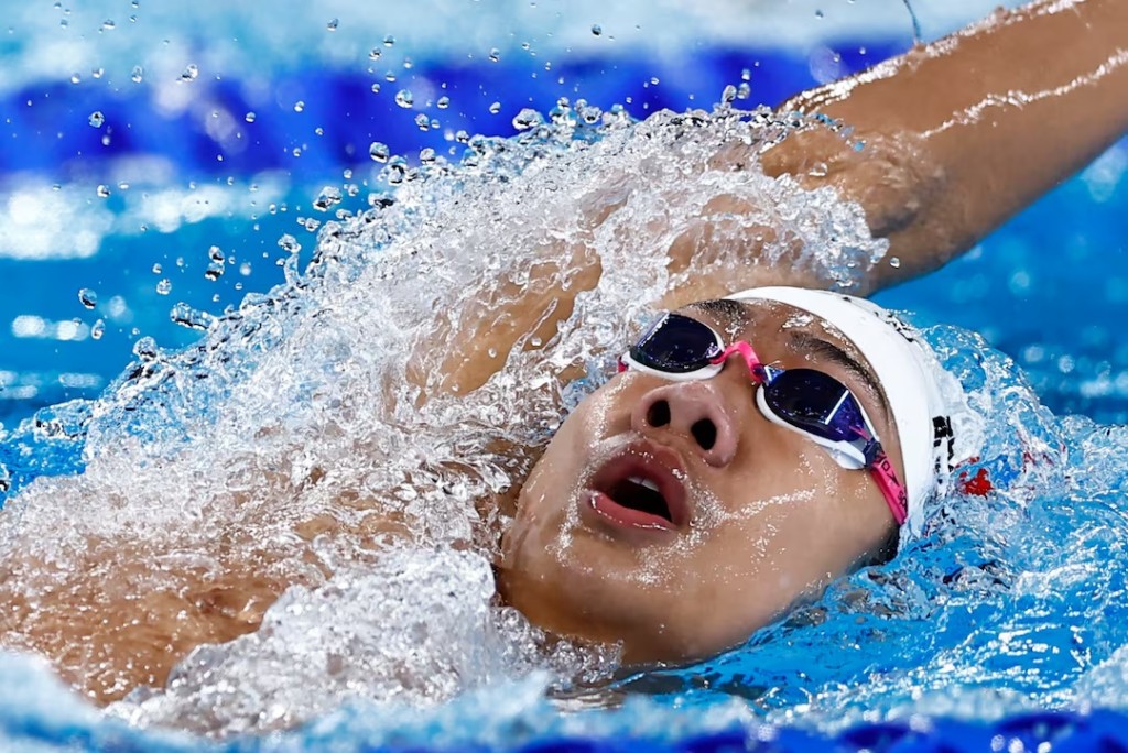 Swimming - World Aquatics Championships - Aspire Dome, Doha, Qatar - February 18, 2024 China’s Zhanshuo Zhang in action during the men’s 400m medley heats REUTERS/Clodagh Kilcoyne 