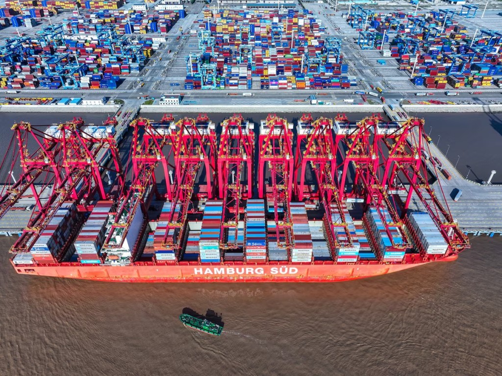 A drone view shows a container ship at a port in Zhoushan, Zhejiang province, China October 10, 2025. cnsphoto via REUTERS