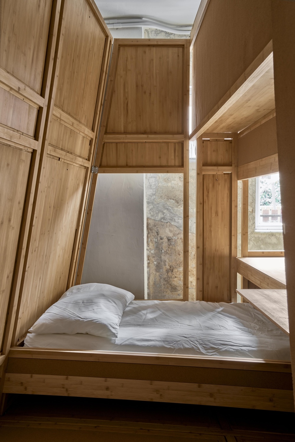 A transitional housing unit in Hong Kong is designed to allow unused buildings to be converted to temporary residences. (Xu Liang Leon via Bloomberg)