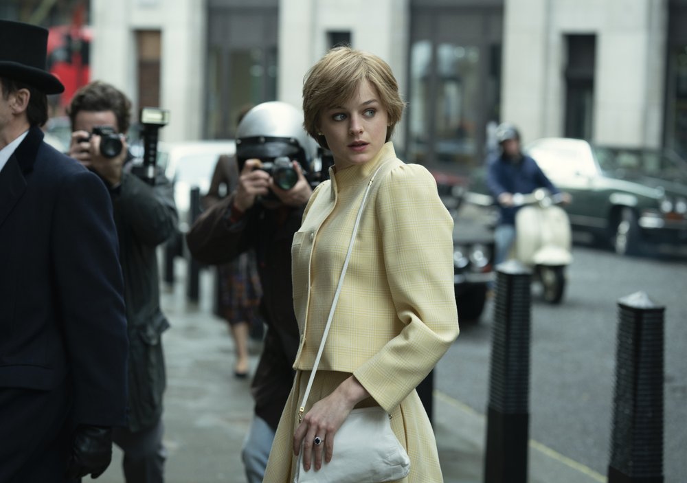 This image released by Netflix shows Emma Corrin in a scene from The Crown. Corrin accepted the award for best actress in a television drama series at the Golden Globe Awards on Sunday. This image released by Netflix shows Emma Corrin in a scene from The Crown. Corrin accepted the award for best actress in a television drama series at the Golden Globe Awards on Sunday.