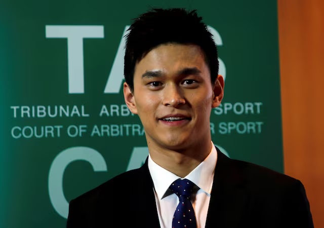 Chinese swimmer Sun Yang poses after a public hearing of the Court of Arbitration for Sport (CAS) for the appeal filed by the World Anti-Doping Agency (WADA) against him and the Federation Internationale de Natation (FINA), at the Conference Centre of the Fairmont Le Montreux Palace, in Montreux, Switzerland November 15, 2019. REUTERS/Denis Balibouse/File Photo