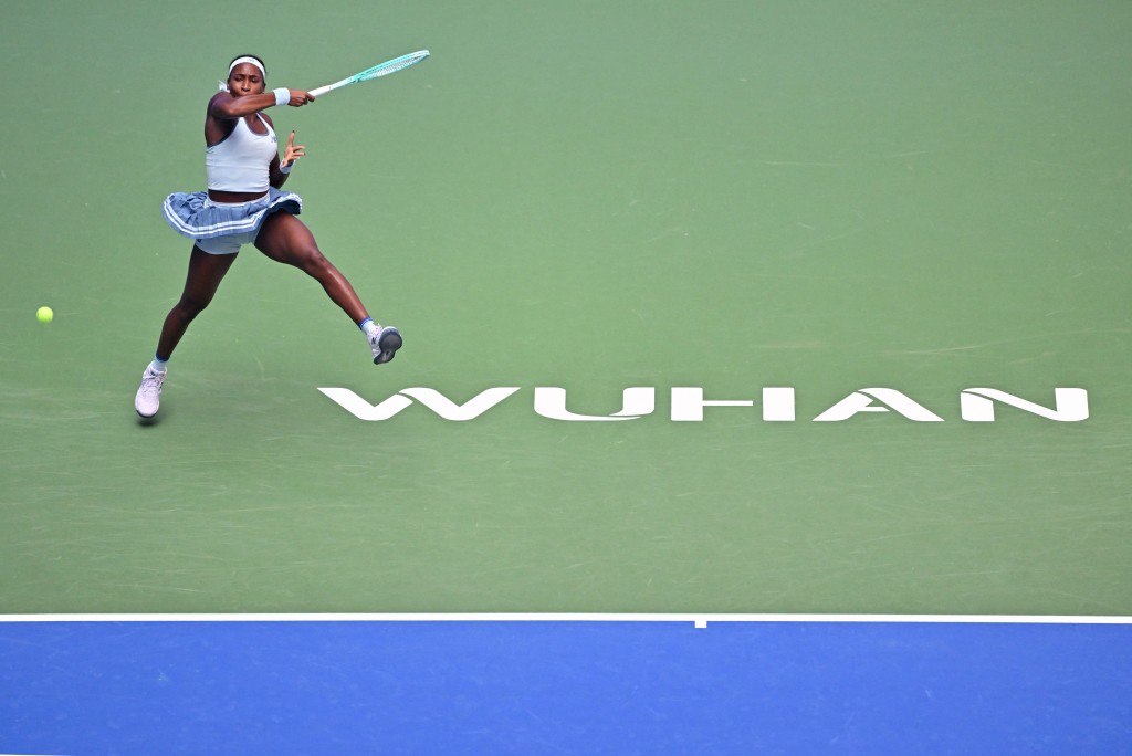 USA's Coco Gauff hits a return to Japan's Moyuka Uchijima during their women's singles match at the Wuhan Open tennis tournament in Wuhan, central China's Hubei province on October 8, 2025. (Photo by ADEK BERRY / AFP)