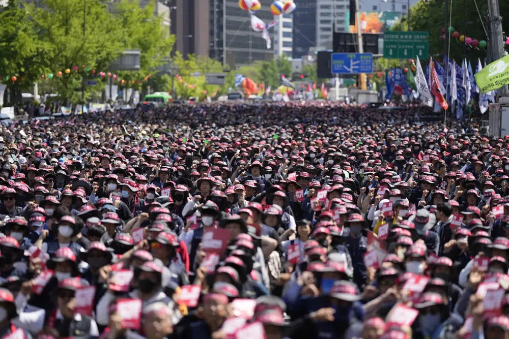 Members of the Korean Confederation of Trade Unions shout slogans during a rally on May Day in Seoul, South Korea, Monday, May 1, 2023. A large number of workers and activists in Asian countries are set to mark May Day on Monday with protests calling for higher salaries and better working conditions, among other demands. (AP)