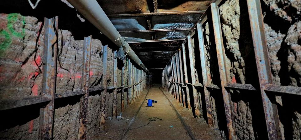 This photograph shows the inside of a cross-border tunnel between Mexico and the U.S. after the announcement of the discovery May 13, 2022 of a subterranean tunnel inside a warehouse in San Diego, California. (Reuters) This photograph shows the inside of a cross-border tunnel between Mexico and the U.S. after the announcement of the discovery May 13, 2022 of a subterranean tunnel inside a warehouse in San Diego, California. (Reuters)