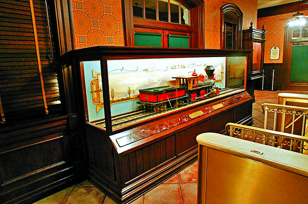 A model train replicating Walt Disney's backyard creation, named after wife Lilly Belle, is placed in Main Street, USA, Train Station. 