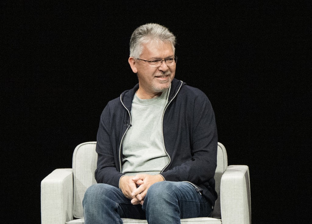 Photo by NIC COURY / AFP  John Giannandrea, senior VP of machine learning and AI strategy, speaks during Apple's annual Worldwide Developers Conference (WDC) in Cupertino, California on June 10, 2024.