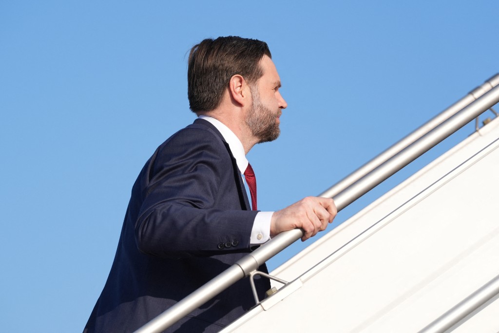 Photo by JACQUELYN MARTIN / POOL / AFP US Vice President JD Vance boards Air Force Two after attending talks on Iran in Islamabad on April 12, 2026.