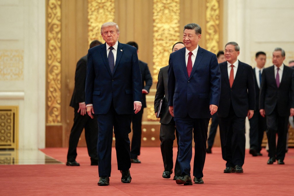 U.S. President Donald Trump and Chinese President Xi Jinping arrive to attend a state banquet at the Great Hall of the People in Beijing, China, May 14, 2026. (Reuters)