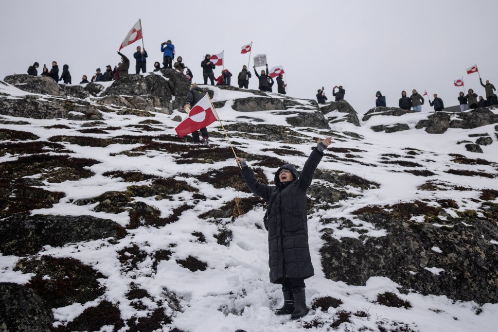 People attend a protest against U.S. President Donald Trump's demand that the Arctic island be ceded to the U.S., calling for it to be allowed to determine its own future, in Nuuk, Greenland, January 17, 2026. (Reuters)