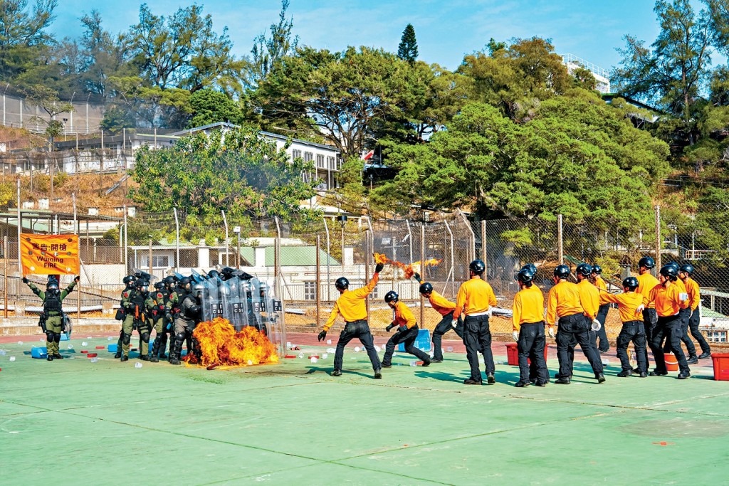 Response team members perform a tactical demonstration at the opening ceremony.