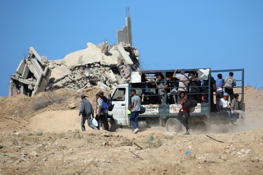 Gaza's civil defence agency said on October 10 that Israeli forces have begun pulling back from parts of the territory, particularly in Gaza City and Khan Yunis. Israeli prime minister's office said that the government had "approved the framework" of a hostage release deal with Hamas, as both sides edged closer to ending more than two years of hostilities in Gaza.  Photo by EYAD BABA / AFP