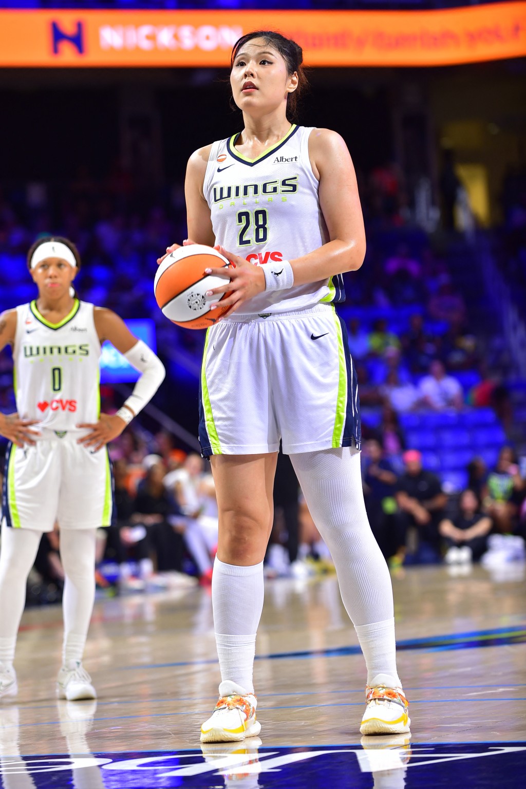 Li Yueru #28 of the Dallas Wings shoots a free throw during the game against the Connecticut Sun on August 30, 2026 at the College Park Center in Arlington, TX. NOTE TO USER: User expressly acknowledges and agrees that, by downloading and or using this photograph, User is consenting to the terms and conditions of the Getty Images License Agreement. Mandatory Copyright Notice: Copyright 2026 NBAE Michael Gonzales/NBAE via Getty Images/AFP 