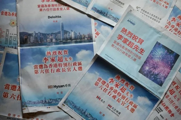 Western multinationals and local tycoons published newspaper adverts congratulating John Lee on becoming Hong Kong's next leader. (AFP) Western multinationals and local tycoons published newspaper adverts congratulating John Lee on becoming Hong Kong's next leader. (AFP)