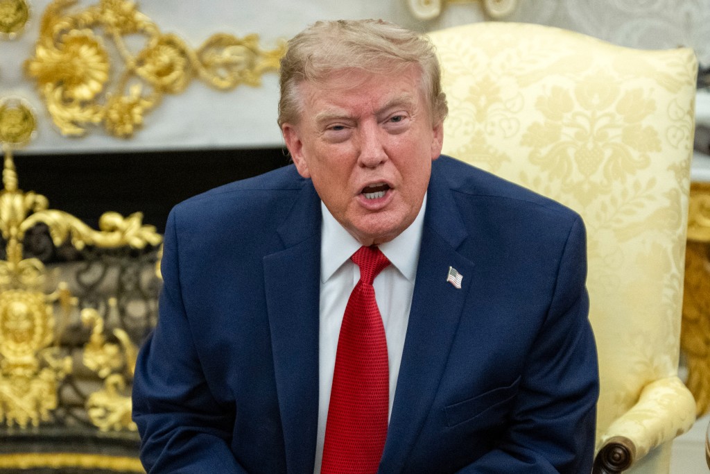 Photo by JIM WATSON / AFP  US President Donald Trump speaks as he meets with lifeguard Ryder Williams in the Oval Office of the White House in Washington, DC, on August 17, 2026.