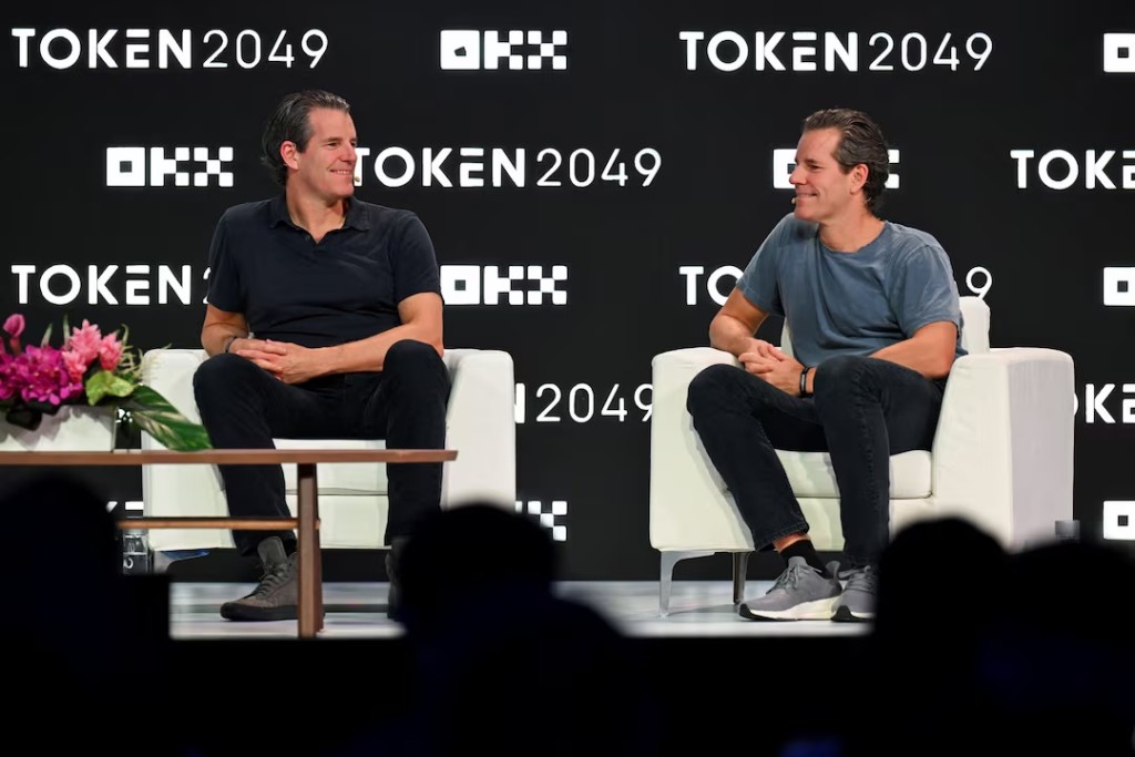 Gemini co-founders, Tyler and Cameron Winklevoss attend TOKEN2049 crypto conference in Singapore October 7, 2026. REUTERS/Caroline Chia