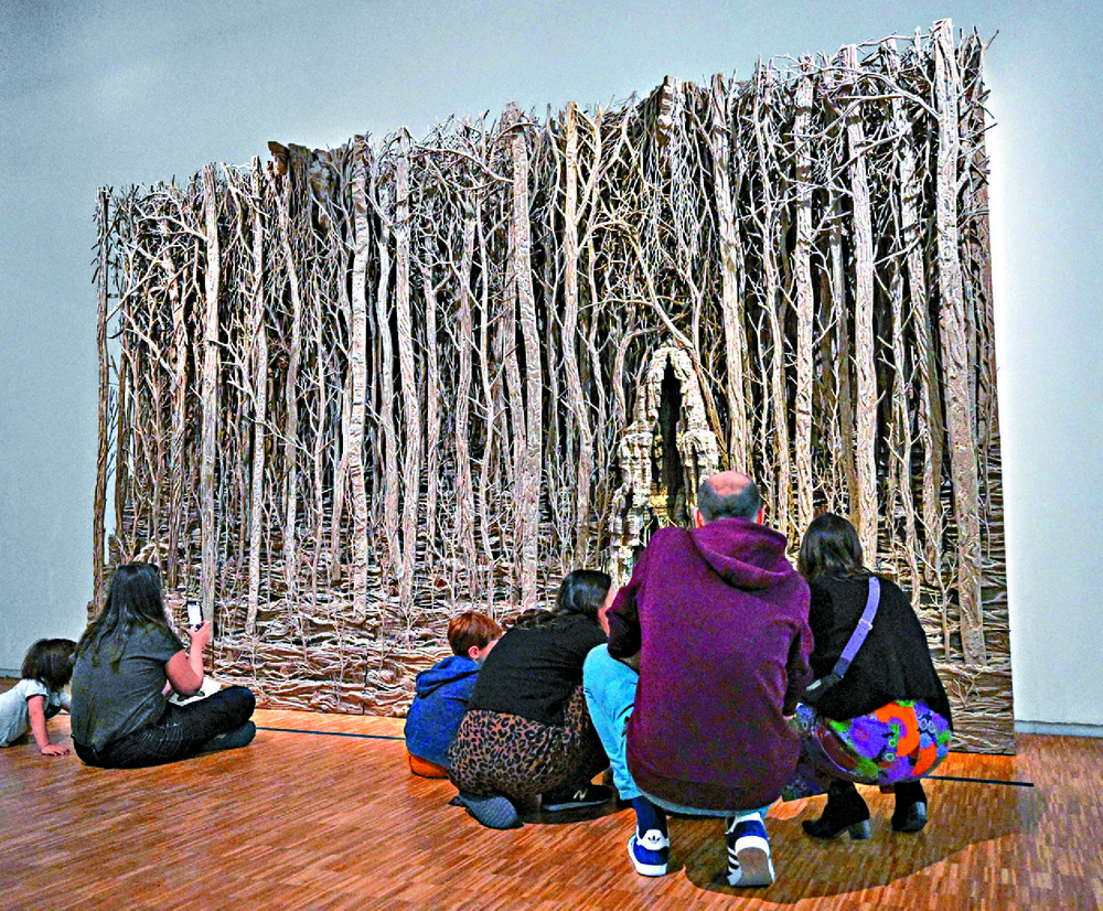 Visitors check out artworks inside the Pompidou, whose facade is famously designed with pipes and ventilation shafts. The museum will be closed for five years. AFP Visitors check out artworks inside the Pompidou, whose facade is famously designed with pipes and ventilation shafts. The museum will be closed for five years. AFP