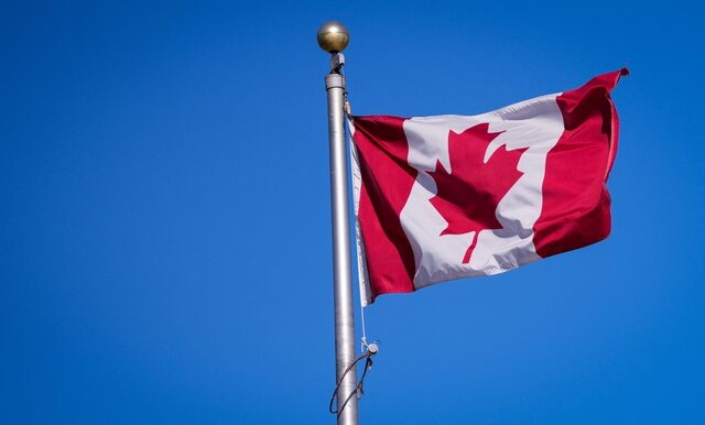 A Canadian flag is pictured a the Manoir Richelieu before the G7 Foreign Ministers summit in La Malbaie, Quebec, Canada March 12, 2025. REUTERS/Mathieu Belanger/File Photo