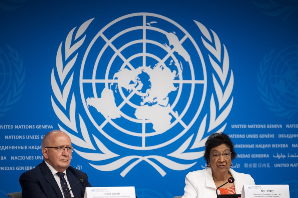 Chair of the Independent International Commission of Inquiry on the Occupied Palestinian Territory, including East Jerusalem, and Israel, South African judge Navi Pillay (R) speaks next to member of the Independent International Commission of Inquiry on the Occupied Palestinian Territory, including East Jerusalem, and Israel, Chris Sidoti speaks during a press conference in Geneva on September 16, 2025. (Photo by Fabrice COFFRINI / AFP)