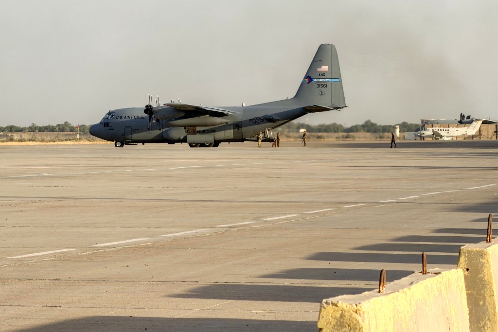 Photo by AMMAR KARIM / AFP / A US Air Force C-130 Hercules military transport aircraft prepares for takeoff from Camp Victory on the outskirts of Baghdad International Airport on September 29, 2026.