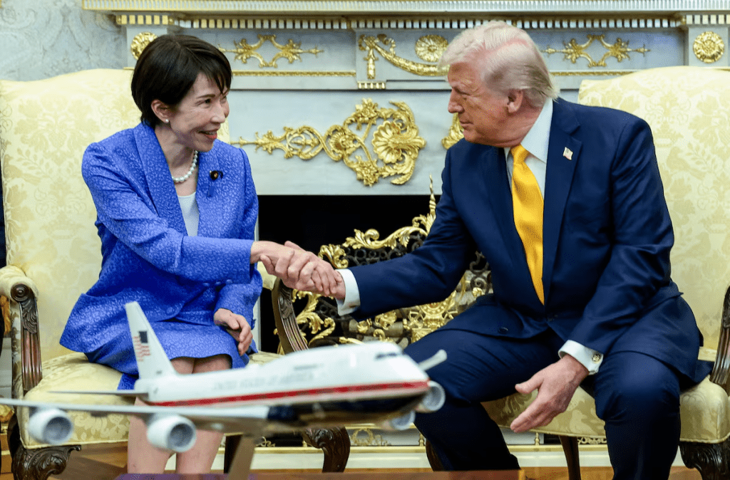 U.S. President Donald Trump shakes hands with Japanese Prime Minister Sanae Takaichi in the Oval Office at the White House in Washington, D.C., U.S., March 19, 2026. REUTERS/Evelyn Hockstein