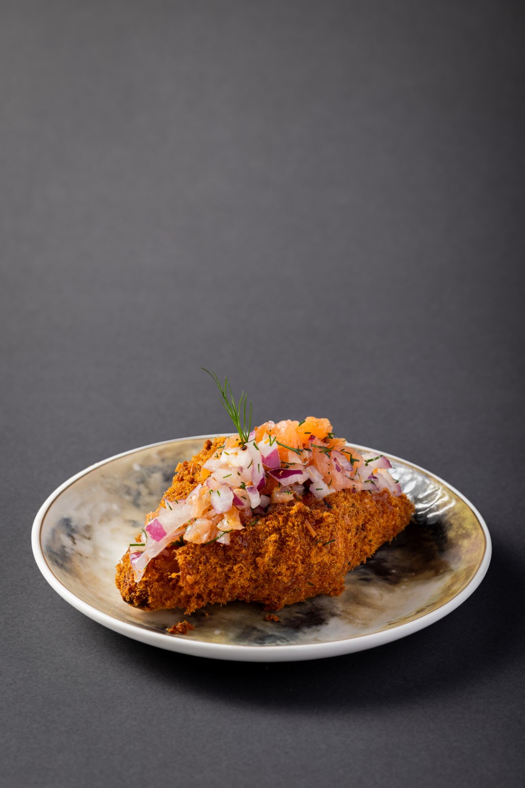 Salmon Floss Croissant (Maxim’s Cakes, festival exclusive) - a flaky croissant filled with smoked salmon is finished with upcycled salmon floss from the Salmon Bone Upcycling Project, adding a sustainable twist to the savory pastry.