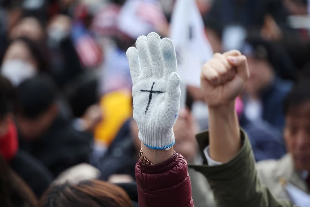 People attend a rally organised by the Christian group Save Korea, in Seoul, South Korea, March 8, 2025. REUTERS/Kim Hong-Ji People attend a rally organised by the Christian group Save Korea, in Seoul, South Korea, March 8, 2025. REUTERS/Kim Hong-Ji