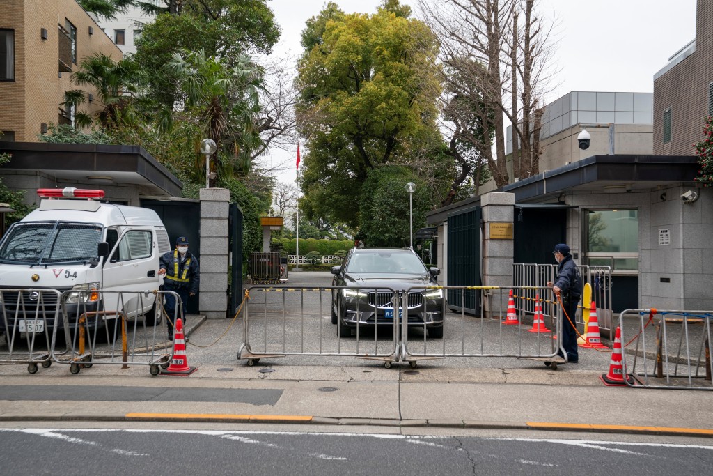 Photo by KAZUHIRO NOGI / AFP  An entrance to the Chinese embassy is seen in Tokyo on March 25, 2026.