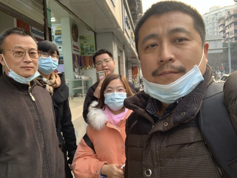 In this photo taken by Ren Quanniu, Ren Quanniu, right, and other supporters of lawyer Lu Si Wei pose for a group photo in Chengdu in southwestern China's Sichuan Province, Wednesday, January 13, 2021. A Chinese lawyer who represented a Hong Kong pro-democracy activist was stripped of his law license on Friday, January 15, 2021 amid efforts by Beijing to crush opposition to its tighter control over the territory. (Ren Quanniu via AP) In this photo taken by Ren Quanniu, Ren Quanniu, right, and other supporters of lawyer Lu Si Wei pose for a group photo in Chengdu in southwestern China's Sichuan Province, Wednesday, January 13, 2021. A Chinese lawyer who represented a Hong Kong pro-democracy activist was stripped of his law license on Friday, January 15, 2021 amid efforts by Beijing to crush opposition to its tighter control over the territory. (Ren Quanniu via AP)
