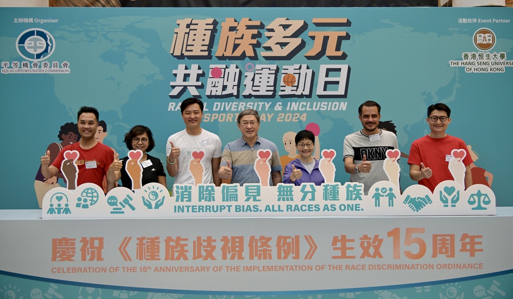 Warner Cheuk, center, promoting diversity. Warner Cheuk, center, promoting diversity.