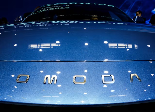 A logo of Chery’s brand Omoda appears on a car as people sit inside at the company’s booth at the Beijing International Automotive Exhibition (Auto China), in Beijing, April 24, 2026. REUTERS/Maxim Shemetov/File Photo