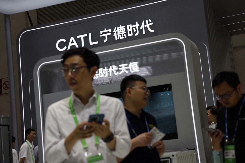 People visit the booth of battery giant CATL during the China International Supply Chain Expo in Beijing, China July 16, 2025. REUTERS/Florence Lo