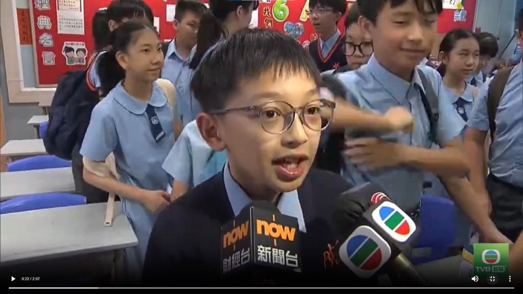 Chu could hardly hide his excitement as he spoke to reporters after being allocated to Wah Yan College, Kowloon. (Scrrengrab from Now News)